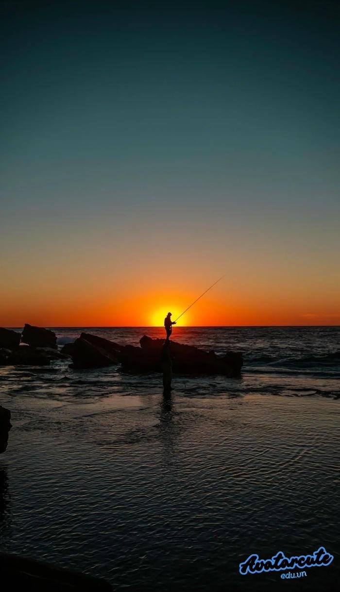 hình nền người câu cá lúc hoàng hôn hd